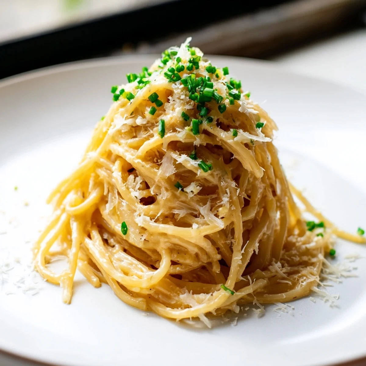 Steaming bowl of Miso Butter Pasta, coated in a rich, glossy miso sauce, ready to be devoured.