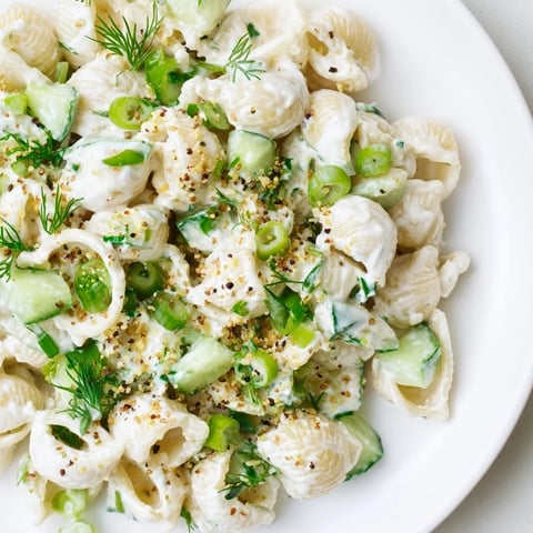 Creamy Cucumber Crunch Pasta Salad with tiny shells, crisp cucumbers, and fresh dill in a tangy dressing, perfect for summer picnics.