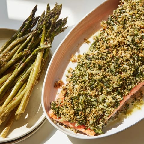 Golden-crusted herb salmon, baked to perfection with tender asparagus; a quick, healthy meal.