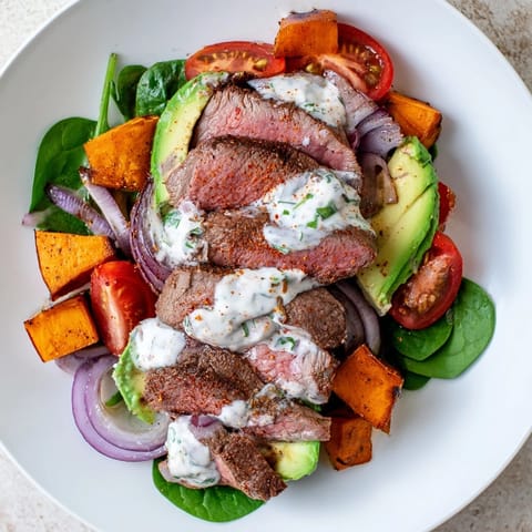 This colorful Beef Avocado Sweet Potato Bowl offers flavorful, healthy ingredients, ready for a satisfying lunch or dinner.